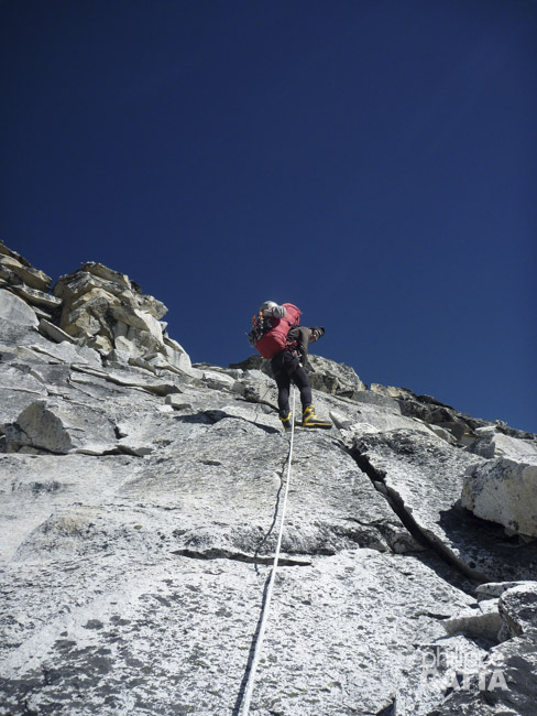 Philippe rappelling down below C2 (Photo © J-M. Wojcik)